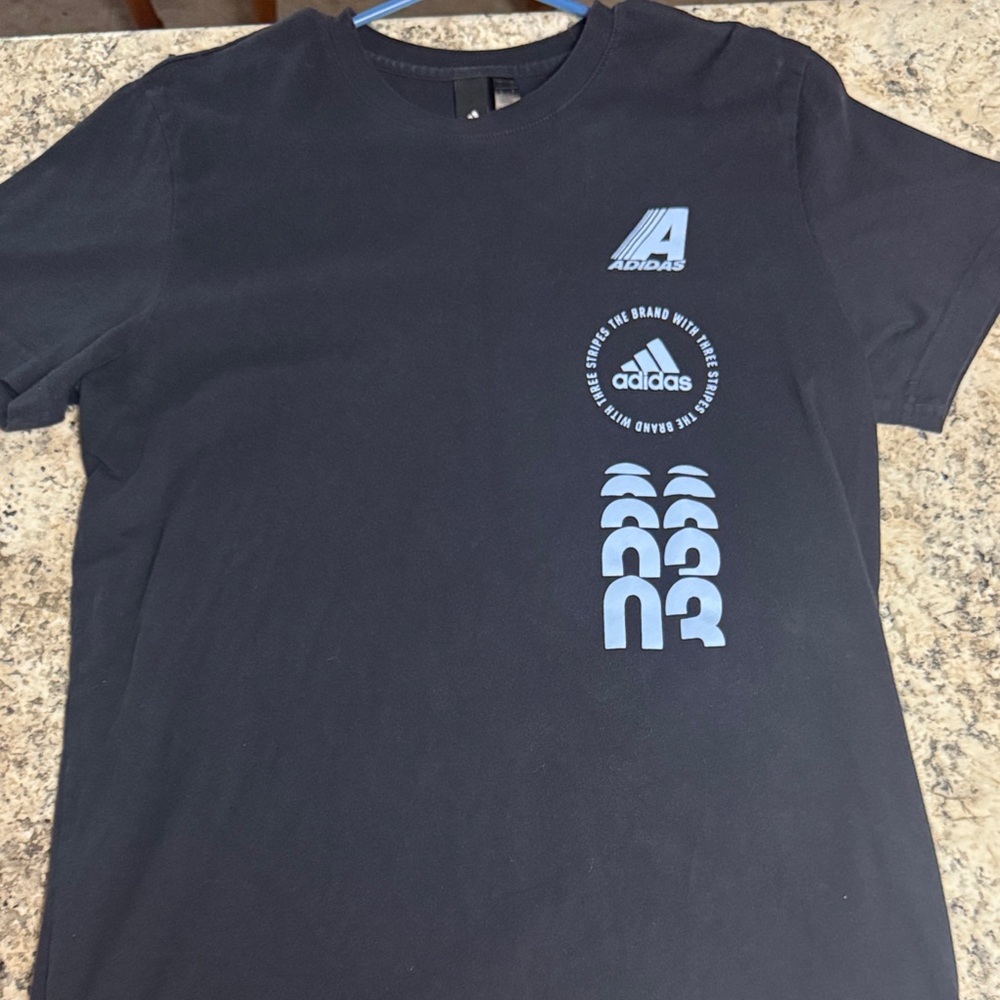 adidas Black Tee with Light Blue Vertical Logo Stack